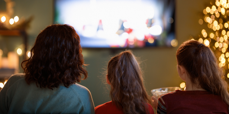 Family watching christmas movies