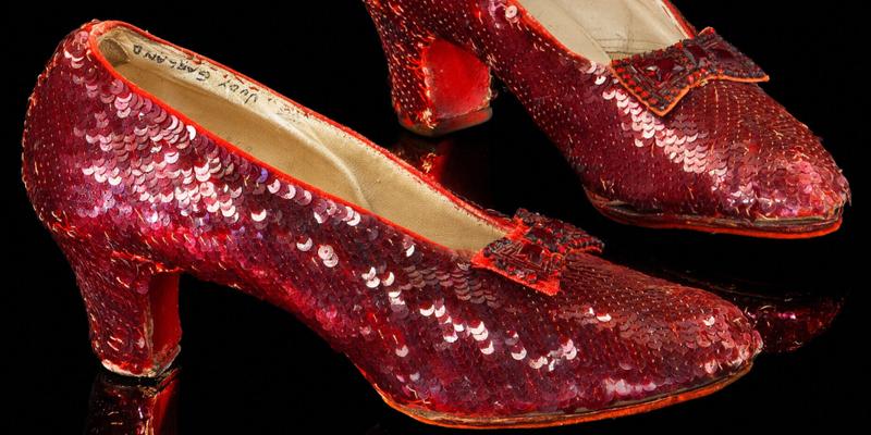 Dorothy's iconic once-stolen ruby slippers from the Wizard of Oz sell for a world record $$32.5 million