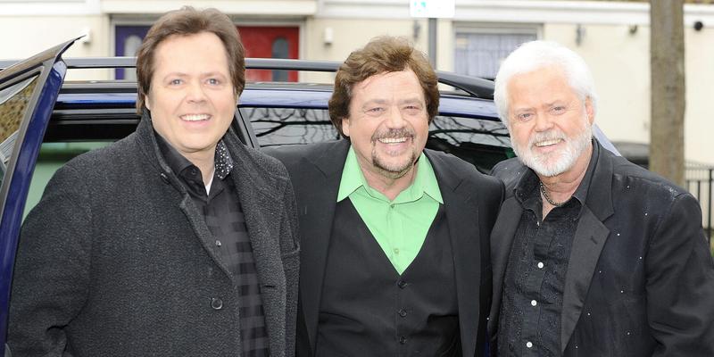 The Osmond Brothers smiling