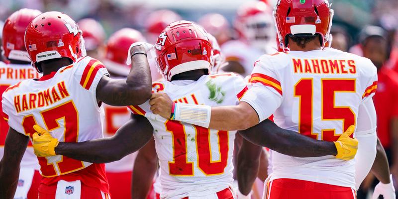 Mecole Hardman, Tyreek Hill, and Patrick Mahomes on NFL field