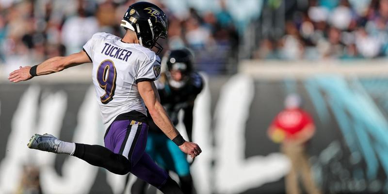 Justin Tucker of the Baltimore Ravens kicking a football.