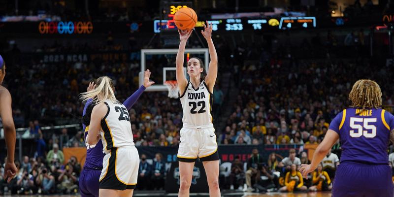 Caitlin Clark shooting a basketball during the championship game against LSU in 2023.