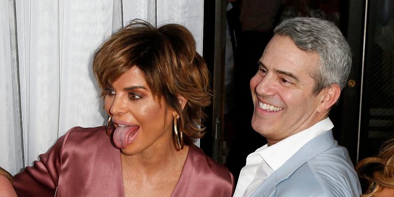 Lisa Rinna and Andy Cohen posing at Cohen's baby shower.