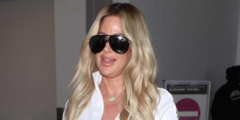 Kim Zolciak makes a sexy arrival as she is spotted at LAX with husband Kroy