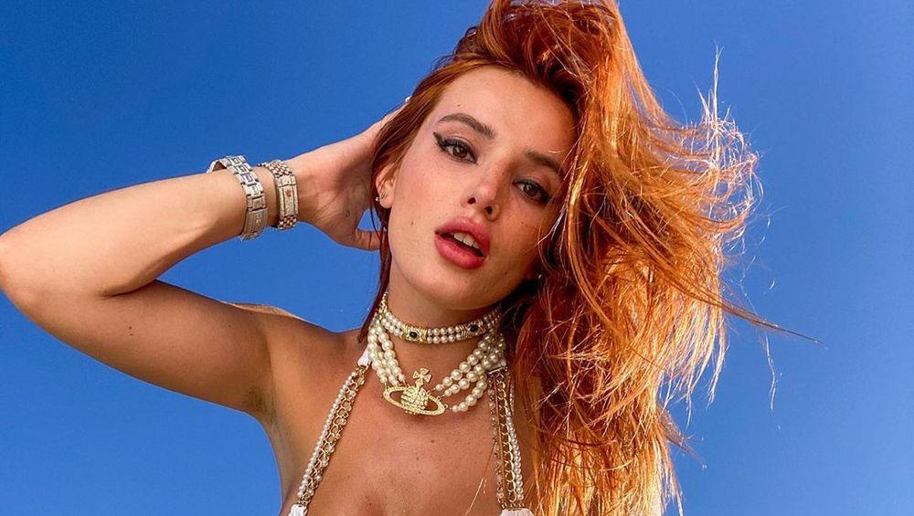 Bella Thorne Slips Open Satin Robe For X-Rated Site Reminder