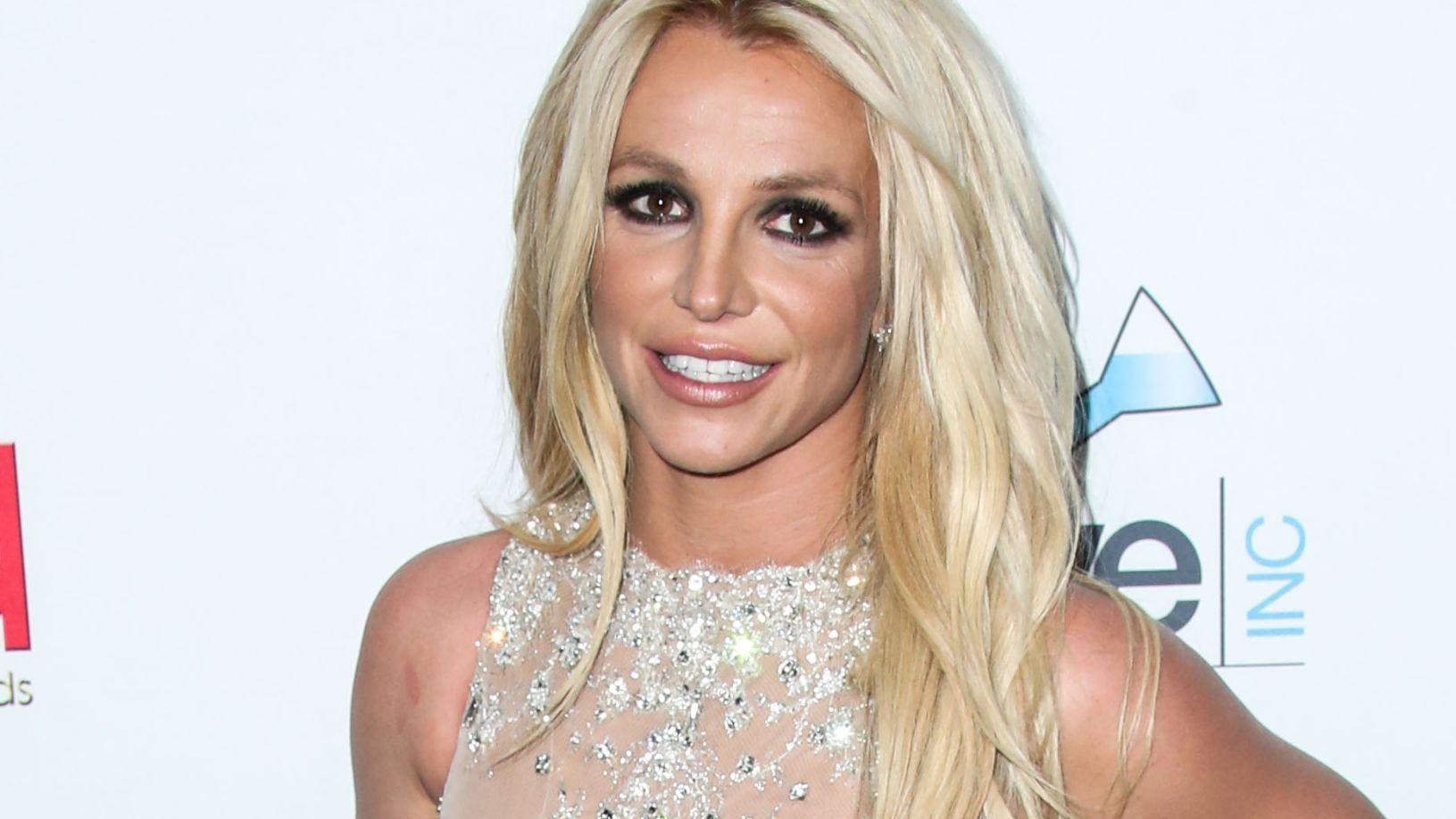 Britney Spears Straddles Boyfriend With Mouth Open
