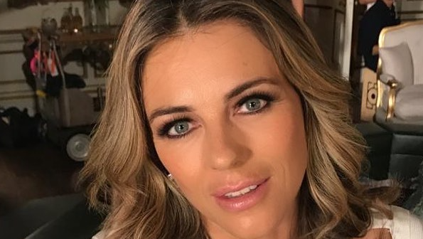 Elizabeth Hurley Is A Christmas Stunner In Plunging ’90s Gucci Holiday Shirt