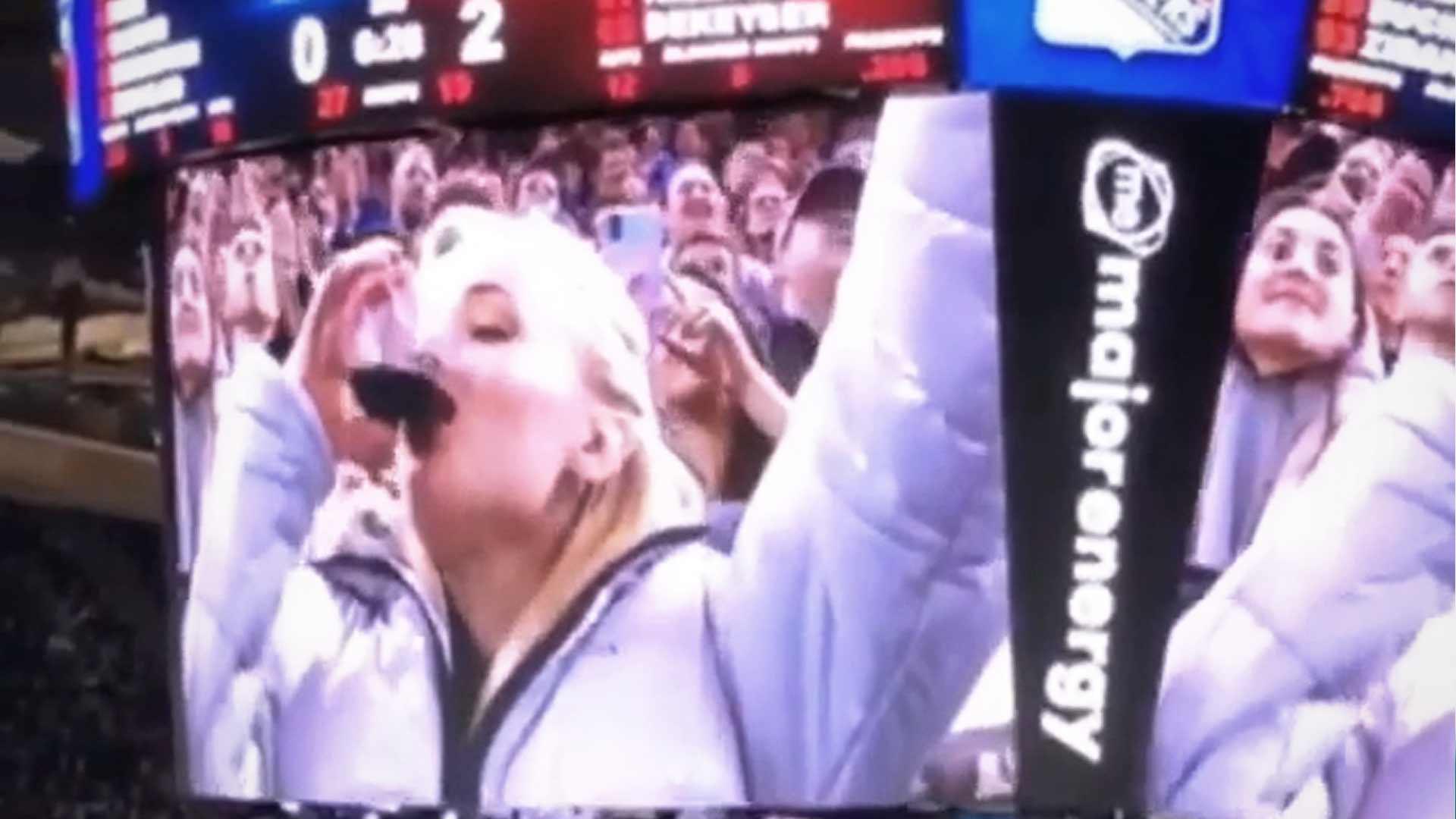 Sophie Turner Dabs and Chugs Wine in Epic Jumbotron Video