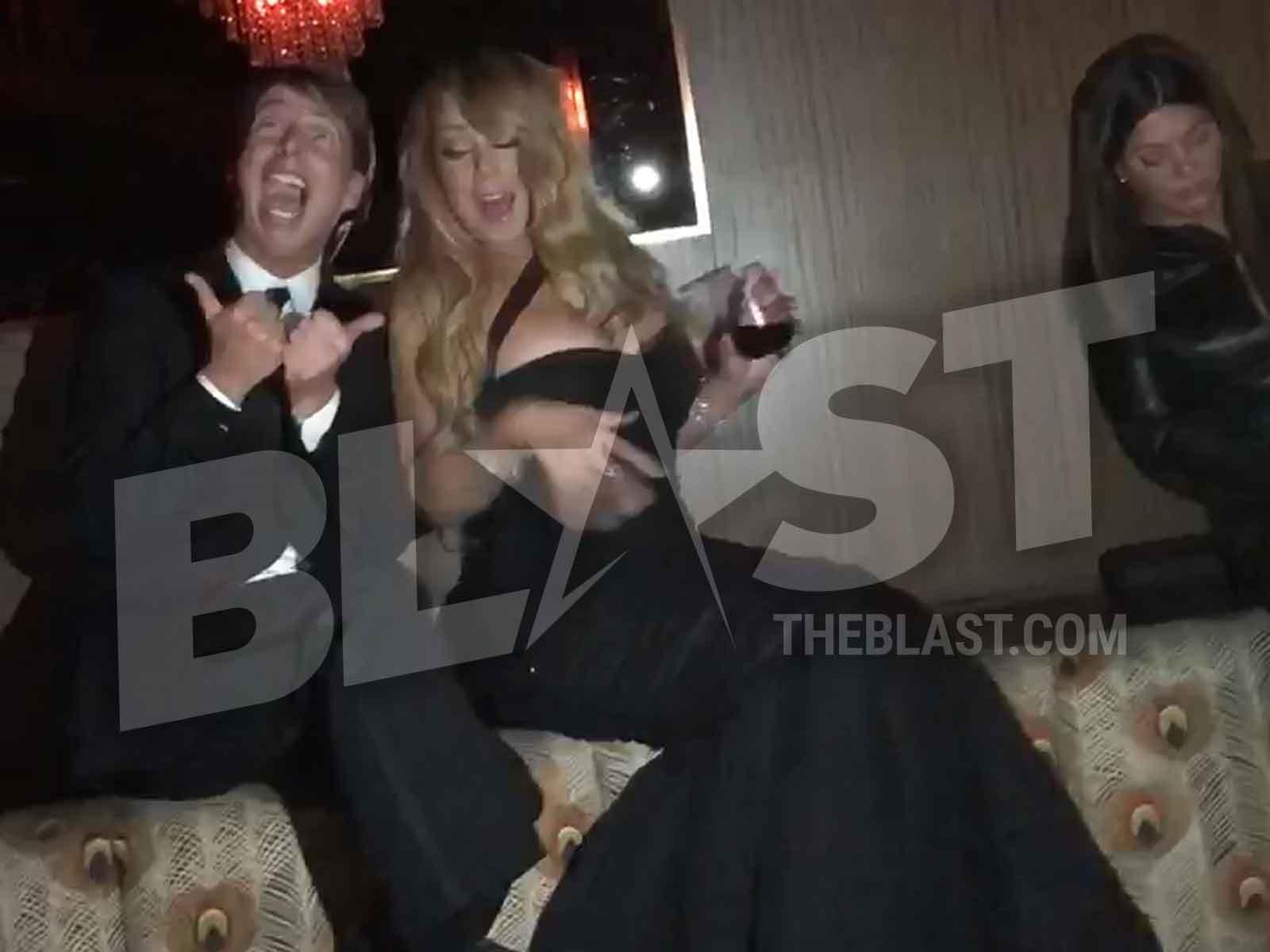 Mariah Carey Flirting With, Serenading Jack McBrayer Is The Only Golden Globes Party Moment That Matters