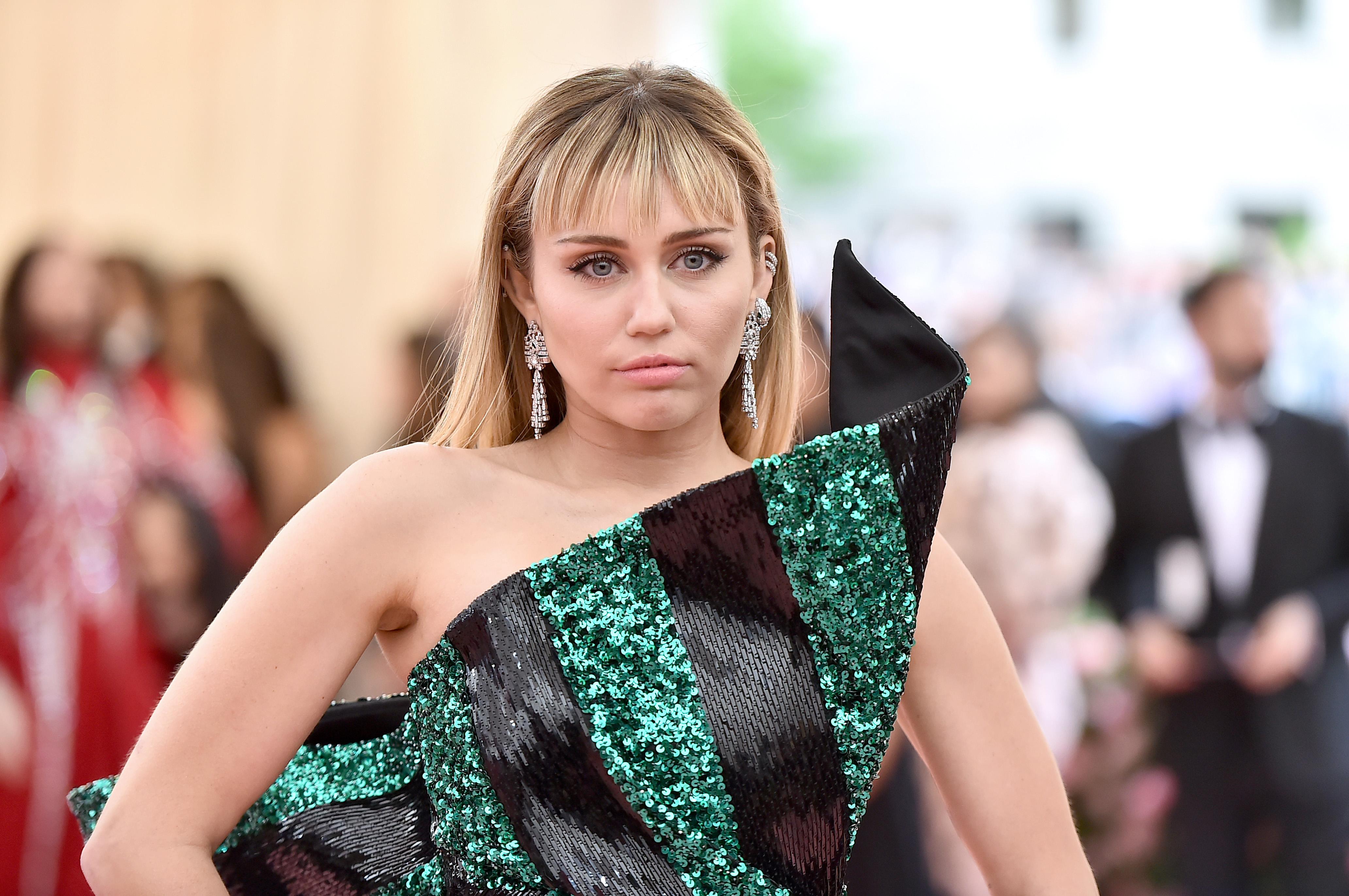 Miley Cyrus Gives A Middle Finger To Instagram Censors With A NSFW Nip Slip