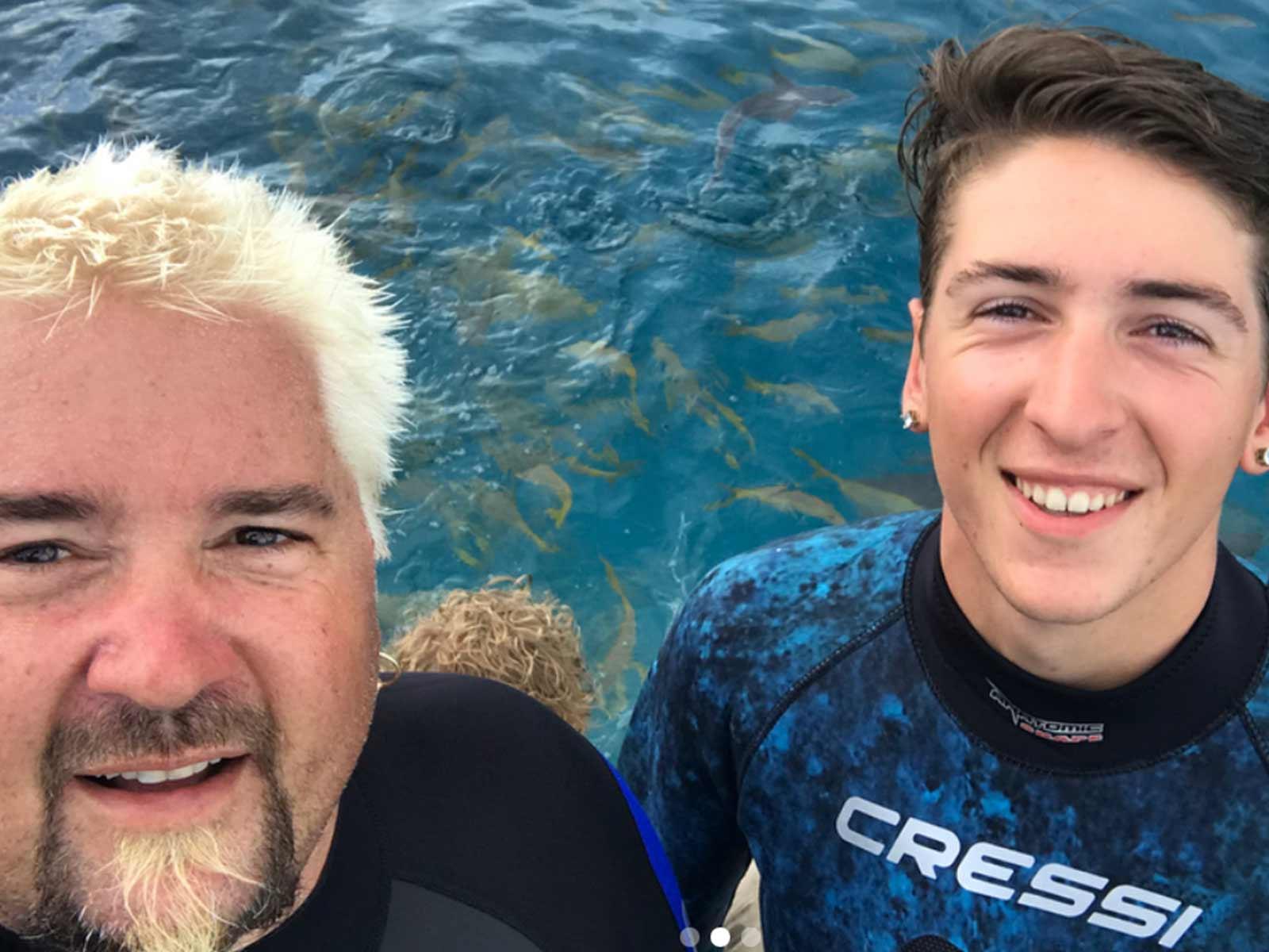 'DDD' Star Guy Fieri Jumps into SharkInfested Waters for 'Shark Week