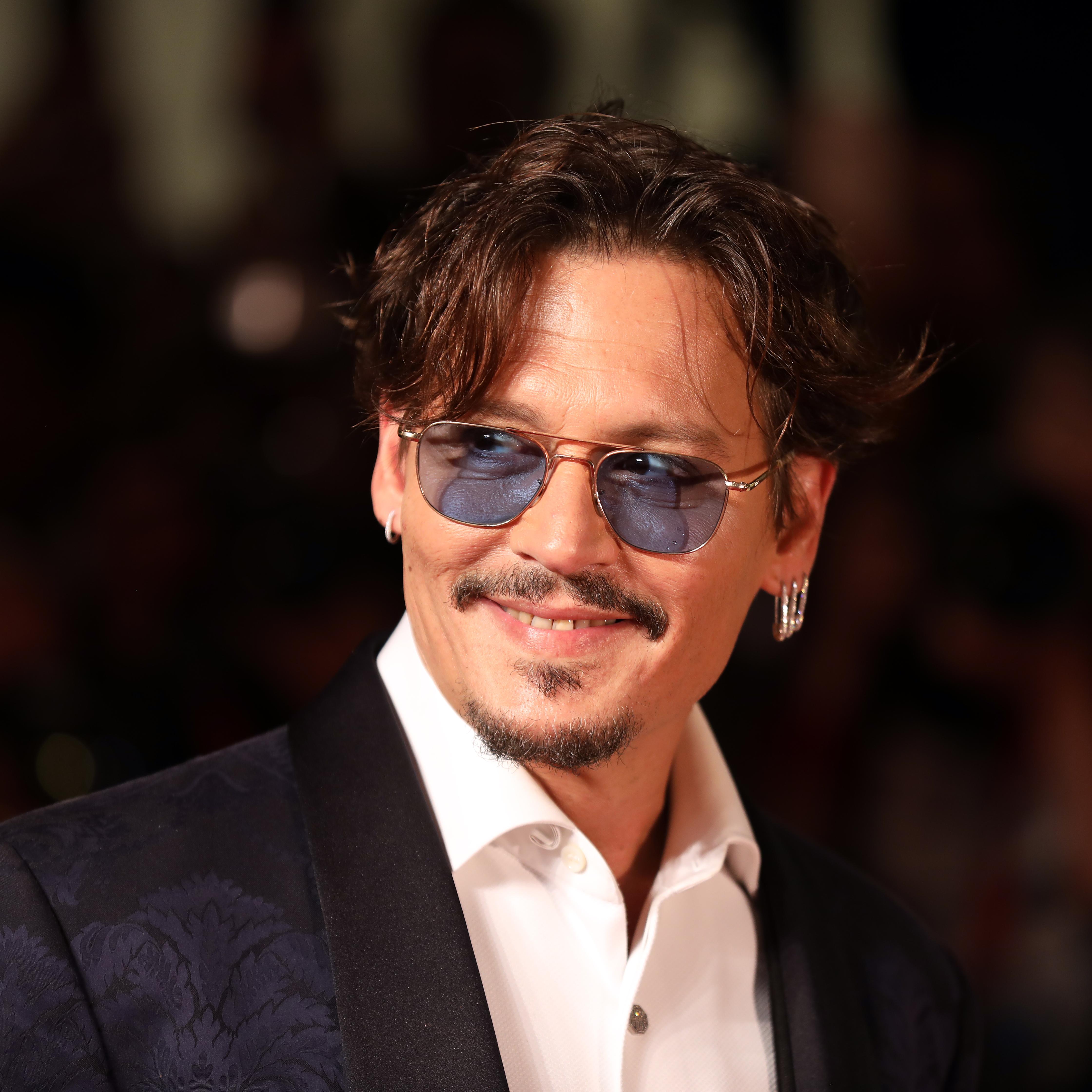 Johnny Depp Collects Barbie Dolls
