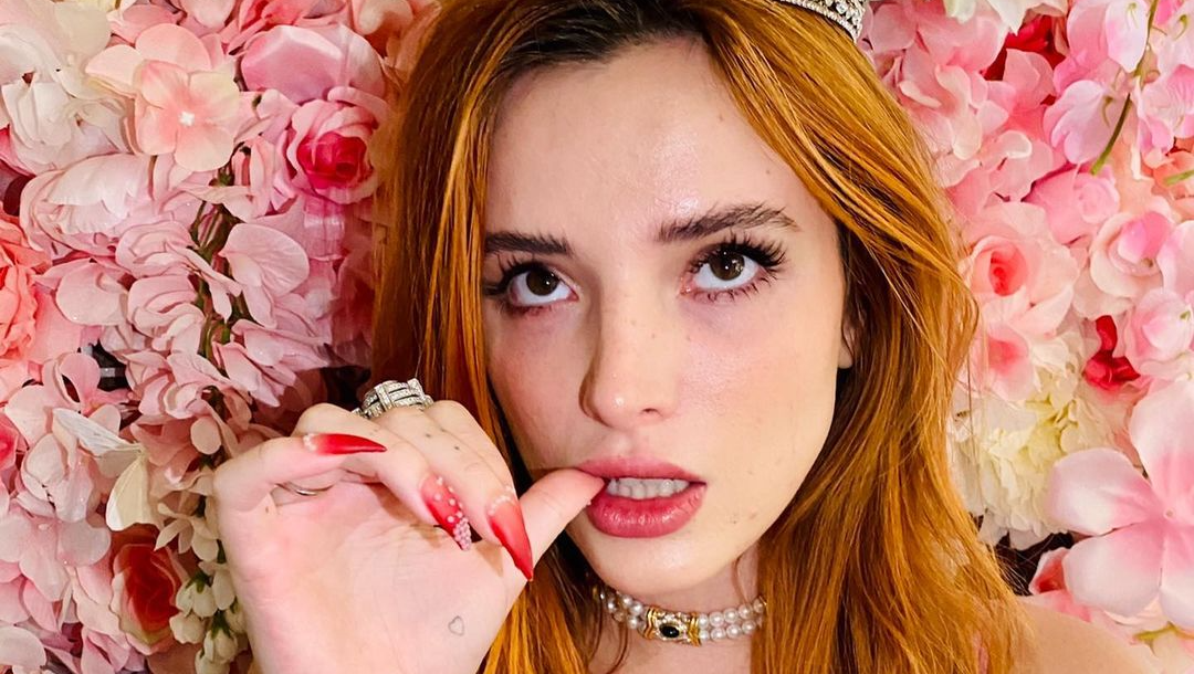 Bella Thorne Flashes Big Beautiful Eyes & Sticks Out Her Tongue For Sultry Selfie