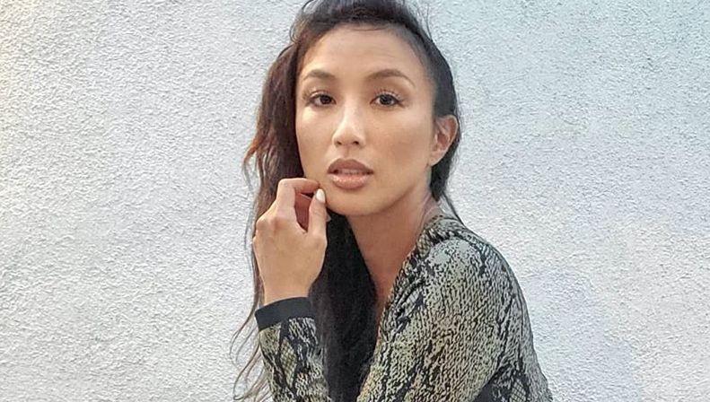 Jeannie Mai Raises Leg In Plunging Denim Swimsuit Before DWTS