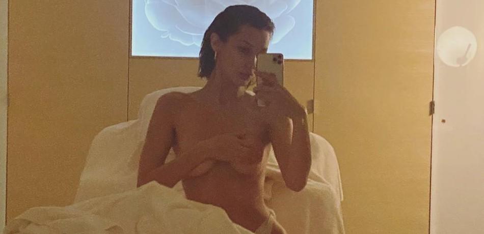 Bella Hadid Stuns In Fully Topless Spa Shot After Sweat-Drenched Towel Falls Off Her