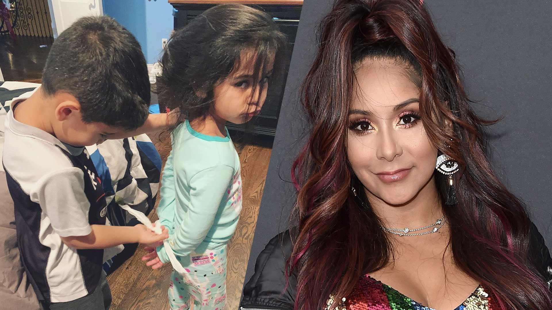 Snooki Shares Hilarious Pic Of Her Daughter Getting Fake Arrested: ‘SHES A GOOD PERSON!’