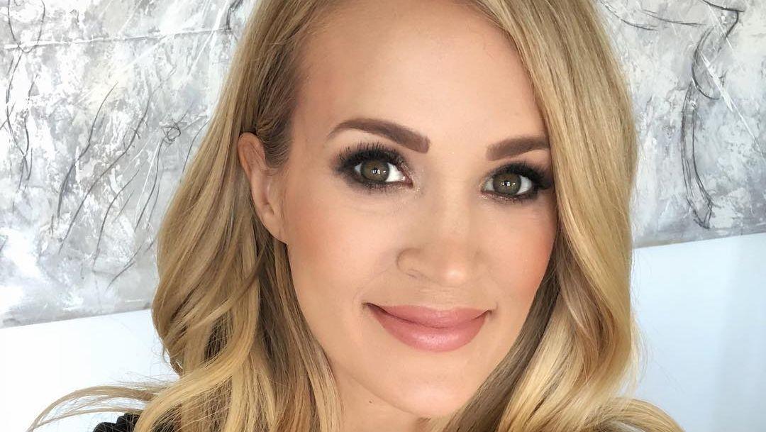 Carrie Underwood Stuns In Workout Tank With 52 Cards