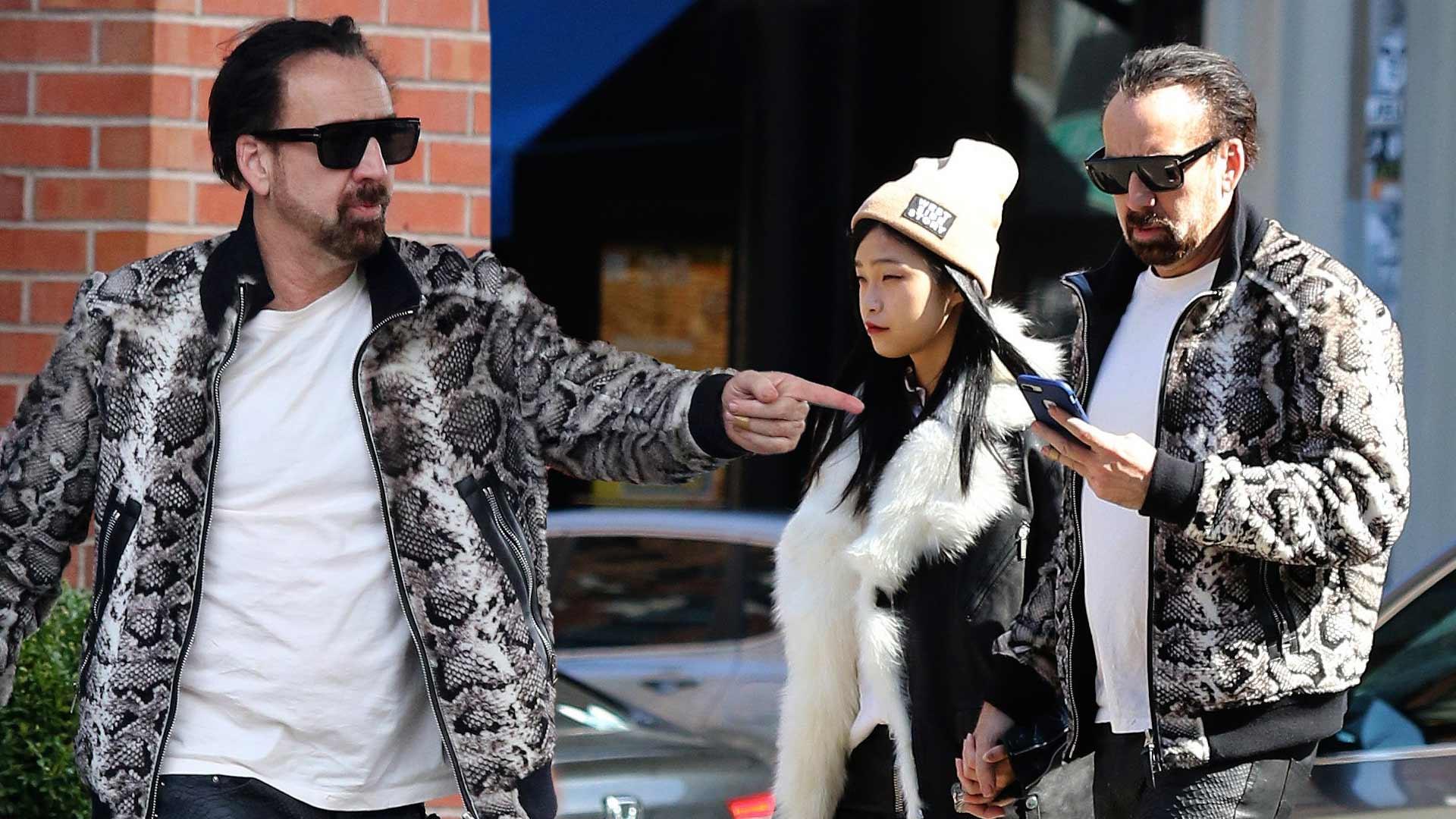 Nicolas Cage Looks Like A Total Bada– While Holding Hands With New GF One Week After Visiting His Own Tomb