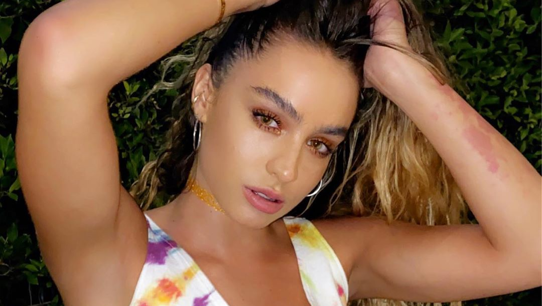 Sommer Ray Gets Wet And Wild Under Rain Shower In  Skimpy Suit