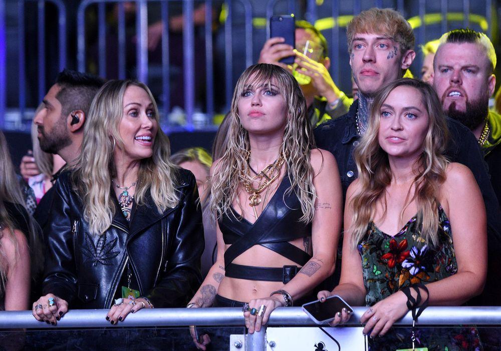 Miley Cyrus' Sister Brandi Shows Off Tight Bikini Body Poolside On
