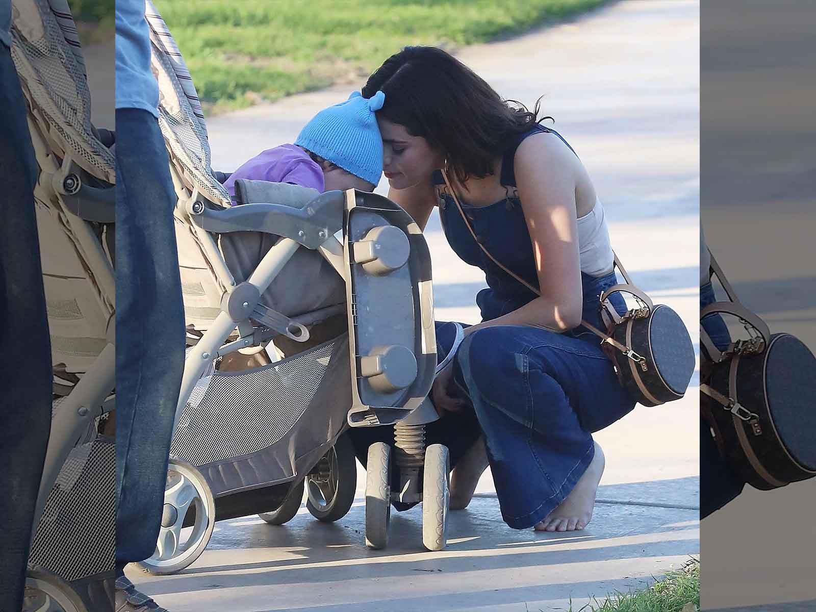 Selena Gomez Wearing Overalls While Nuzzling a Baby Is Cuteness Overload